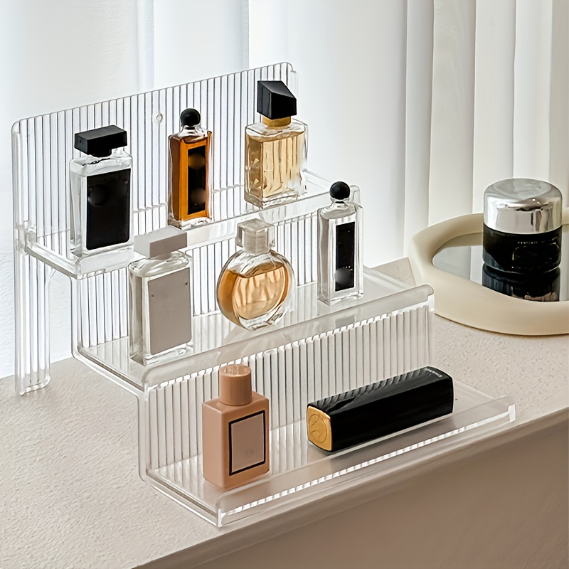 Home Bathroom Design Simple - Ein mehrschichtiges Parfüm-Aufbewahrungsregal - transparenter, geschichteter